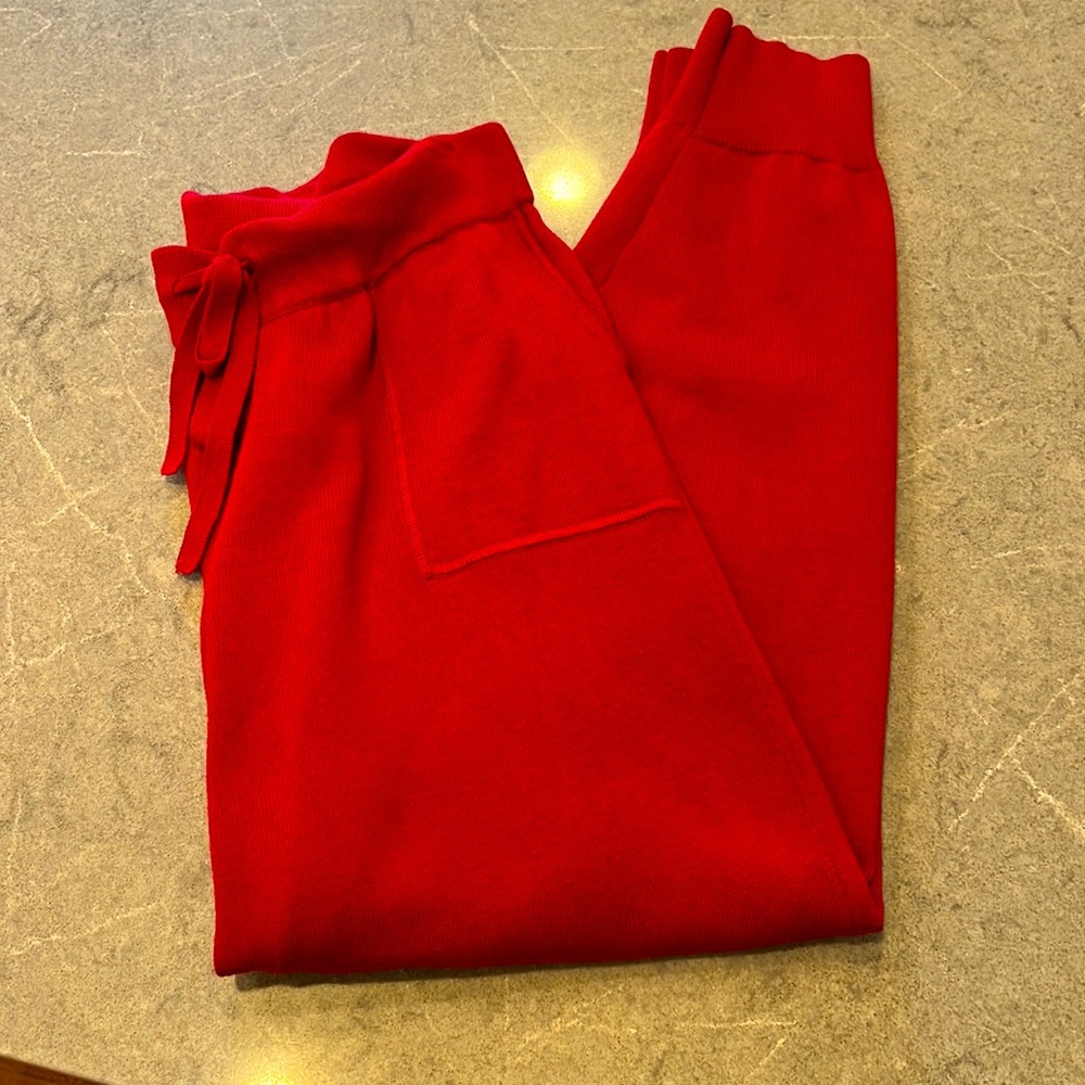 Black merino wool belted sweater
